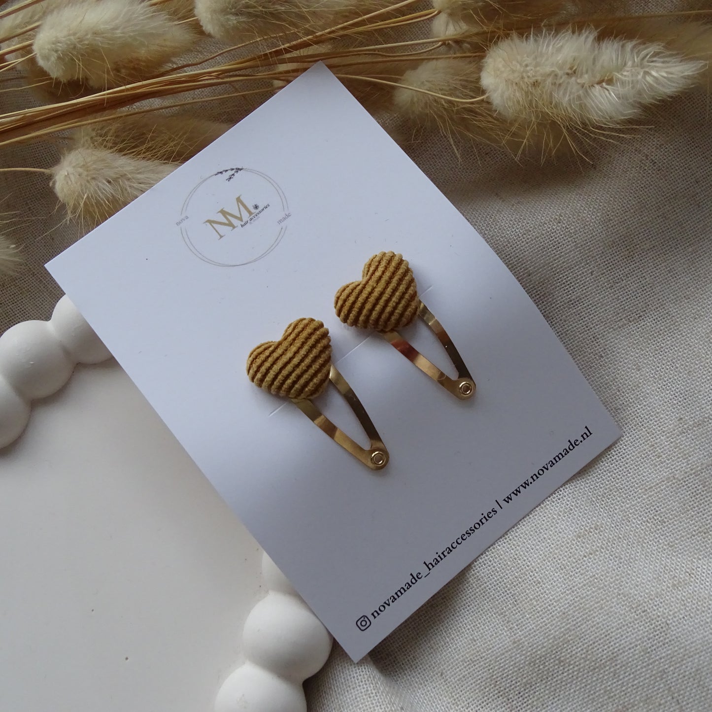 Klikklak | oker gestreept hartje