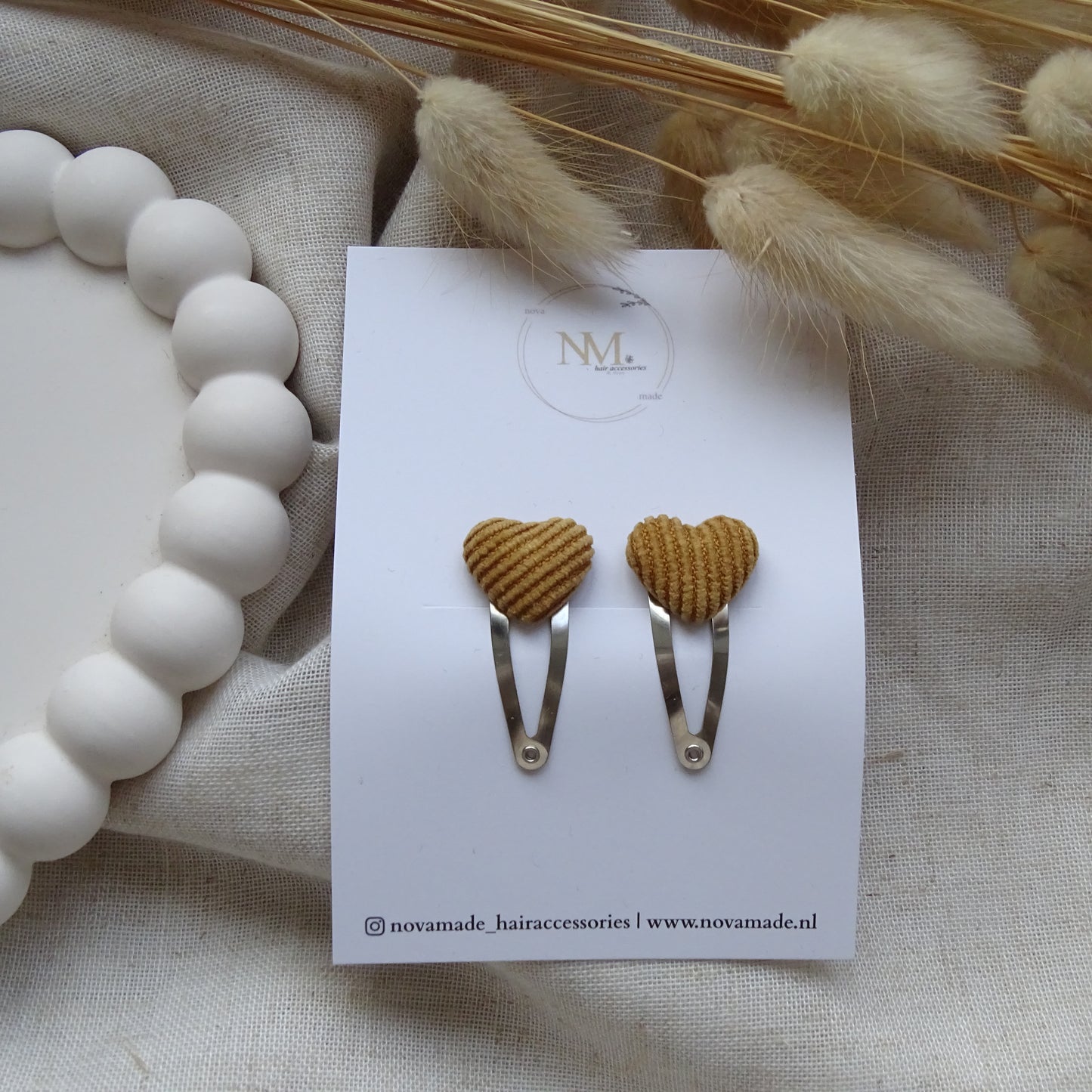 Klikklak | oker gestreept hartje