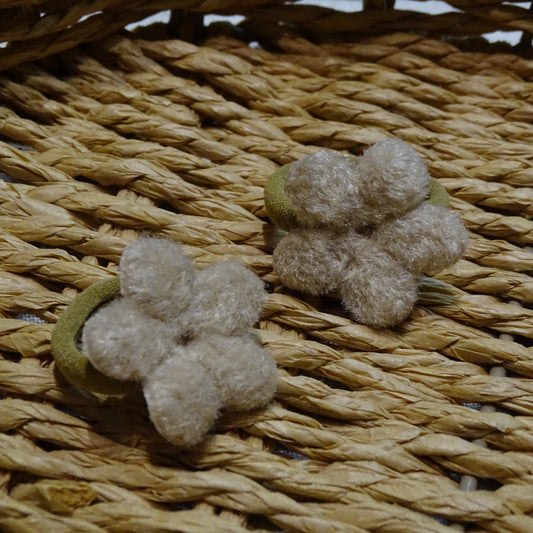 Elastiek | wollen bloem beige
